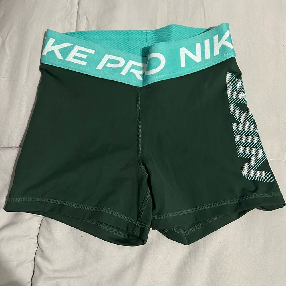 Like new - dark Green and Teal Women’s XS Nike Pro 3” shorts